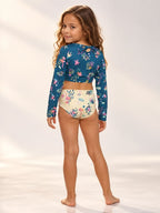 Set Rash Guard Niña estampado tortugas verde jade / arena con panty doble faz